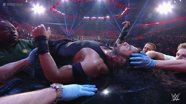 Roman Reigns is attended to by medical personnel: FIRST SEEN ON THE WWE APP, April 13,