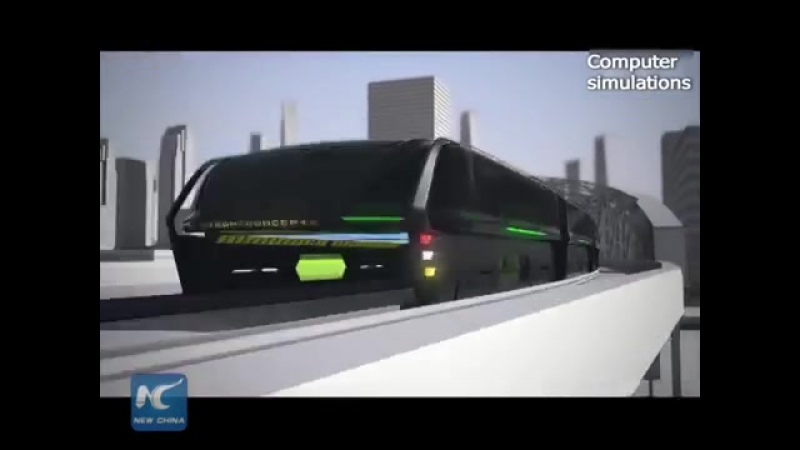 Futuristic straddling bus allows cars running