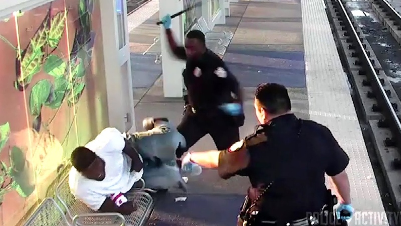 Raw Surveillance Footage Shows Cop Beating Man With