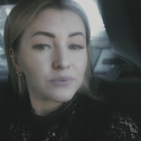 Оля Титова